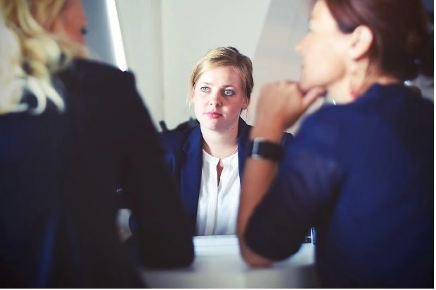 Three woman having a conversation