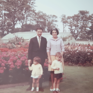 Family photo of Maureen and her husband, Petra and her brother. 