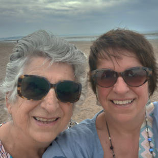Maureen (left) and Petra (right) taking a selfie at the beach. 